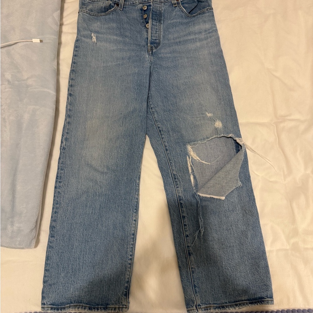 Distressed Blue Jeans